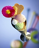 Ice cream sundae with three ice creams, cream & wafers