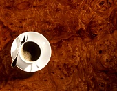 Coffee in a white cup from above