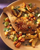 Chicken thighs with mixed vegetables and potatoes