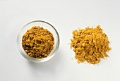Turmeric powder, loose and in glass bowl