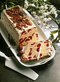 Loaf-shaped ice cream gateau with poppy seeds & cherries 