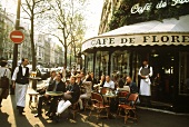 Guests at tables outside the Café de Flore, Paris
