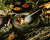 Ingredients for curry spices in a mortar