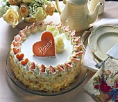 Cream gateau with marzipan heart (and the word "Honey")