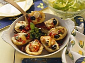 Potatoes with Provencal vegetable filling, cheese topping 