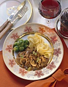 Venison with mushrooms, ribbon noodles & Brussels sprouts
