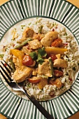 Finely chopped chicken with curried coconut milk sauce 