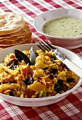 Basmati rice with lamb biryani and cucumber & mint raita