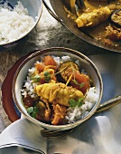 Curried fish rolls served with aubergine 