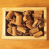 Cinnamon sticks in a wooden box