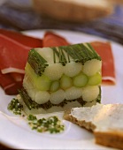 White and green asparagus jelly with vinaigrette & ham