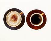 Cup of Cappuccino with a Cup of Black Coffee