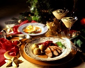 Christmas menu with duck breast, ravioli soup & mousse