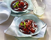 Mixed berry cream with cream sauce in glass bowl
