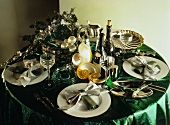 Festive table with shells, pearls, green tablecloth