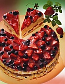 Strawberry and blueberry gateau, pieces cut