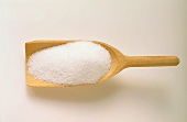 Salt on wooden scoop