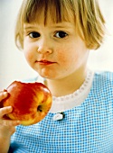 Child Eating an Apple