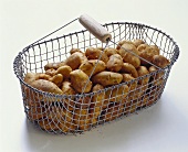 Potatoes (Italian Sieglinde) in wire basket
