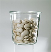 Broad beans in glass container
