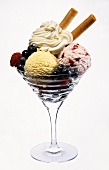 Icecream sundae: forest fruits & vanilla icecream, fruit,cream