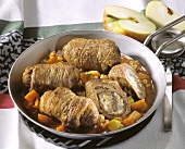 Beef olives with cheese, apple & almond stuffing in the pan