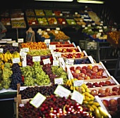 Fresh fruit in crates on a market stall