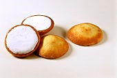 Four Amerikaner cookies (round sponge cookies with iced base)