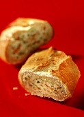 Baguette sandwich with salmon & cream cheese filling, cut up