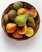 Various pears in a basket