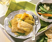 Cod fillets with tarragon sauce, potatoes, mixed vegetables