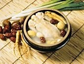 Samgyetang (Korean broth with young chicken and ginseng)