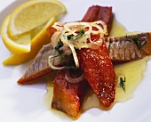 Smoked fish with onions