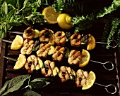 Three grilled eel and courgette kebabs