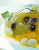 Orange jelly with grapes