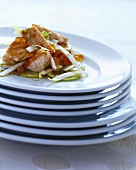 Salmon trout with caviare and chicory on lime slices