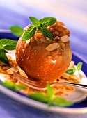 Mela al forno (Baked apple with biscuit stuffing & almonds)