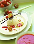 Panna cotta (Cream dessert with strawberry sauce, Italy)