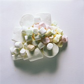 A heap of marshmallows of different colours & sizes 