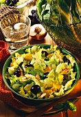 Green salad leaves with grapes, peach pieces & almonds