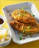 Chicken escalope with peanut crust, with rice & pineapple
