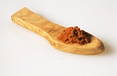 A heap of saffron on wooden scoop
