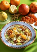 Celery stew with oranges, apricots & flaked almonds