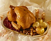 Stuffed turkey, baked apples, chestnuts, red cabbage, dumplings