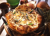 Onion and apple quiche with sage