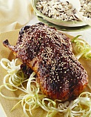 Duck with sesame jacket on spring onions, with rice