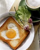 Heart-shaped fried egg on toast