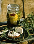 Goat's cheese in olive oil with herbs