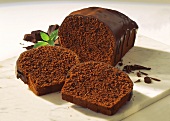 Loaf-shaped chocolate cake with chocolate icing