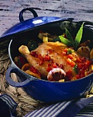 Chicken with vegetables, garlic and potatoes
